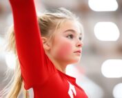 Gymnast salutes the judge focused and ready
